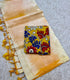 Mangalagiri Ikkat Cream / Off-white silk with a vibrant yellowish-orange / mustard gradient along the border