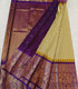 Semi Gadwaal Pattu purple and gold woven saree with a checkered yellow and gold body, a solid purple pallu