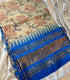 Gadwal Cotton Cream saree with vibrant  blue,  zari (gold-toned) border
