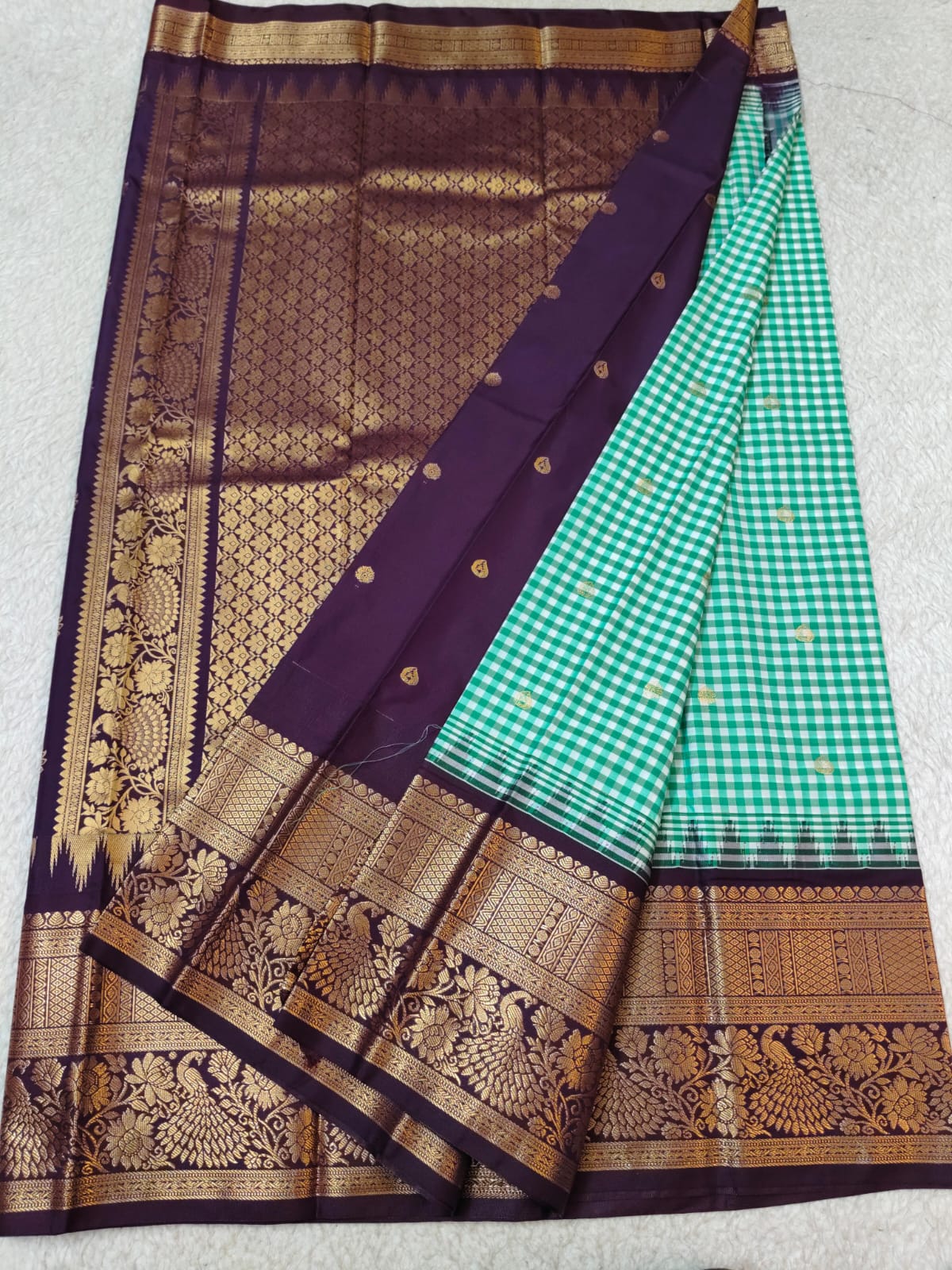 Semi Gadwaal Pattu green and white checkered check patterned silk saree with intricate gold zari brocade border