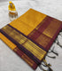 Kalyani Cotton Mustard Yellow with Deep Purple-Brown with intricate gold-toned zari woven patterns and border