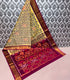Ikkat cotton vibrant yellow base with intricate green and orange ikat patterns