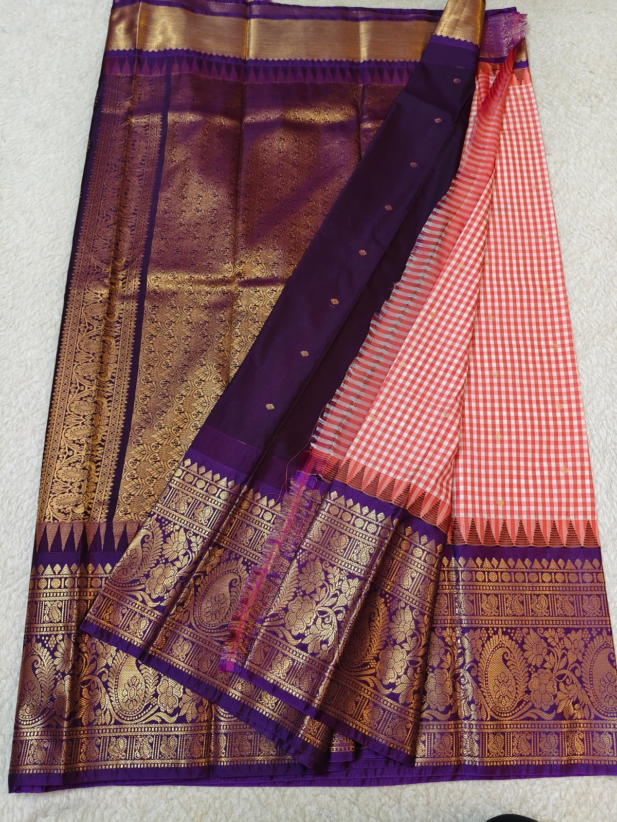 Semi Gadwaal Pattu red and white gingham check patterned silk saree with intricate gold zari brocade border