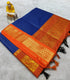 Kalyani Cotton Blue with a fine gold grid pattern
