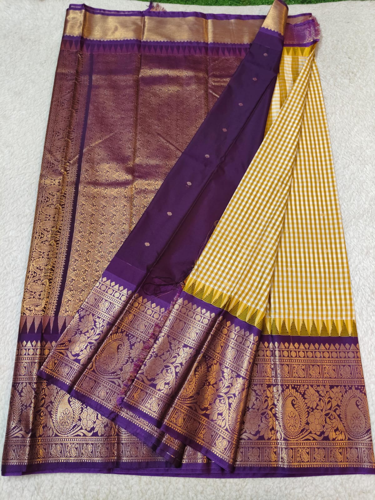 Semi Gadwaal Pattu yellow and white checkered silk saree with intricate gold zari brocade border