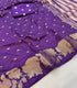 Viscose Crape rich purple  with small, detailed light gold motifs.