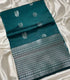 Mangalagiri Pattu teal green  saree with silver zari motifs and a wide striped border