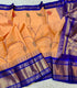Gadwal Cotton Peach / Orange saree with Deep / Royal blue with wide metallic gold and blue zari pallu, border