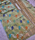 Banarasi paper silk light olive green with gold zari saree with colorful elephant motifs