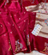 Banarasi Kota silk  rA deep red silk saree with intricate gold zari embroidery, featuring peacock motifs and gold zari border