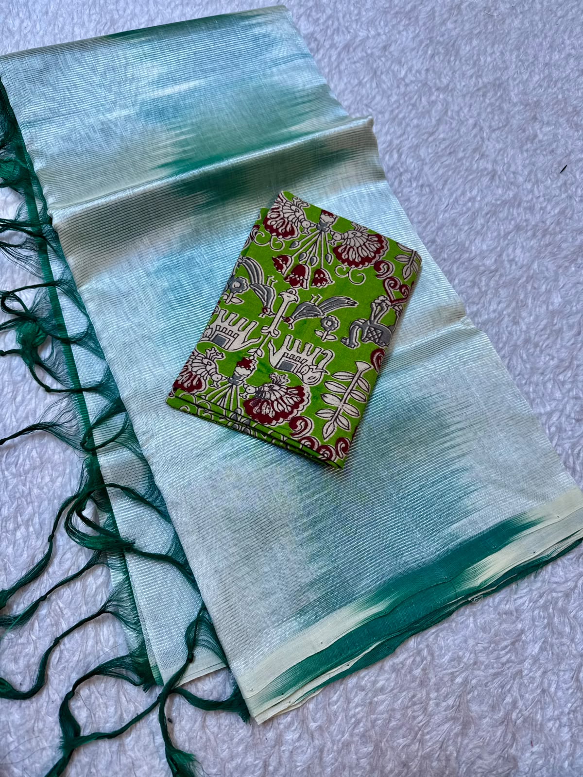 Mangalagiri Ikkat  Light blue and green tie-dye / gradient shading