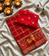 Viscose Georgette bright red grid pattern with golden cow and floral design  pallu