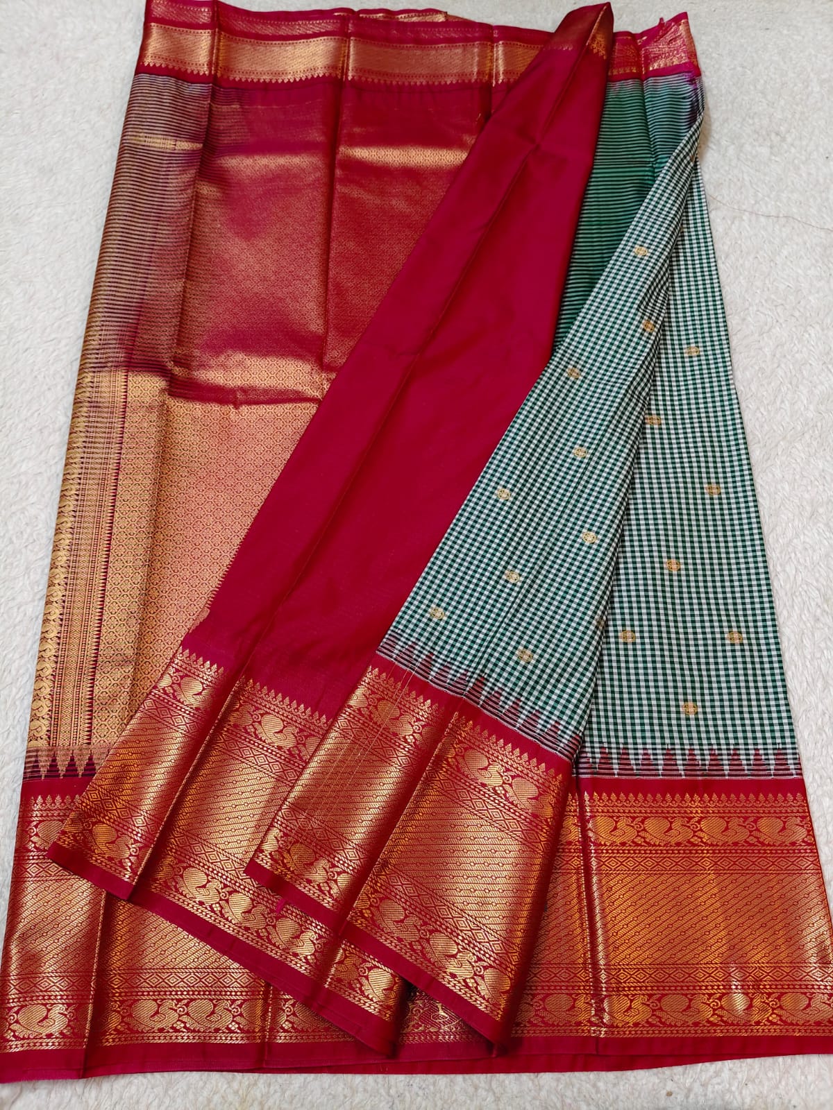 Semi Gadwaal Pattu  teal and white checkered   silk saree with intricate gold zari border