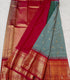 Semi Gadwaal Pattu  teal and white checkered   silk saree with intricate gold zari border