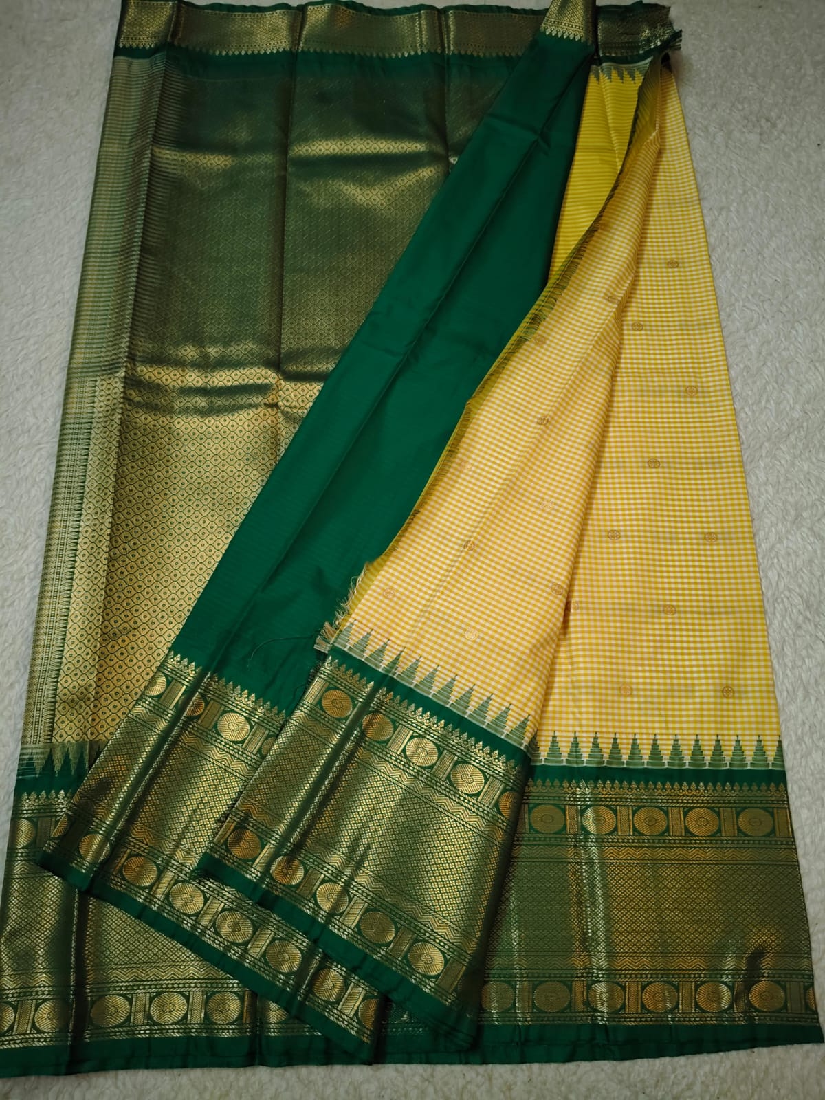 Semi Gadwaal Pattu Yellow and green silk saree with intricate gold zari border