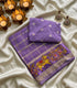 Viscose Georgette violet base adorned with a shimmering gold zari check pattern