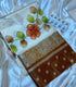 Floral Orange Raw Mango Silk Saree